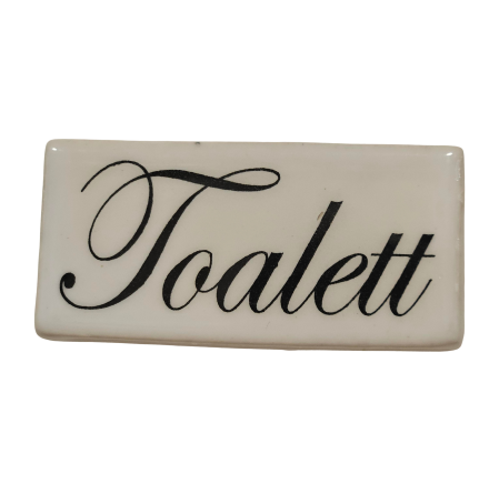Toalett-skylt i porslin